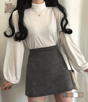 ルーズなエッグタートルネックニット
