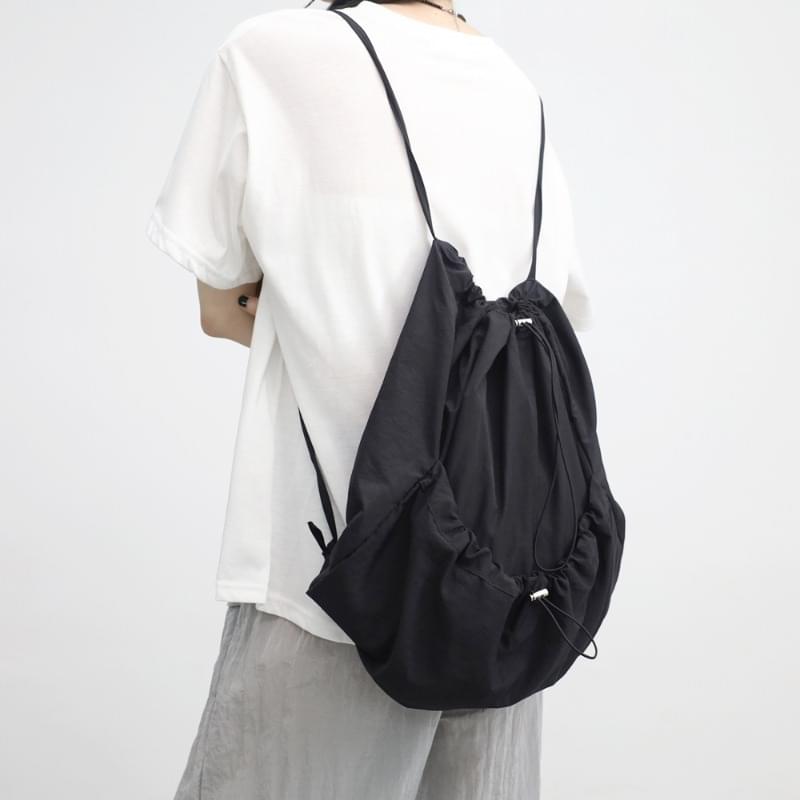NONCODE Newlin nylon string backpack Codibook.