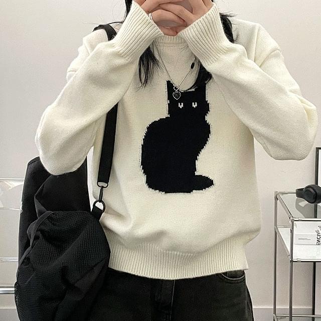 One Black Cat Vintage Loosefit Knitwear Codibook.